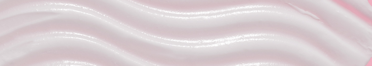 A textural smear of a creamy Mary Kay skin care product